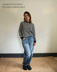 Lisabel wears Audrey Luxe Rib Grey Marl and Black stripes