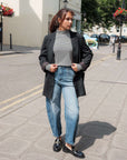 Luxe_funnel_neck_in_ribbed_organic_cotton_stripes_styled_with jacket