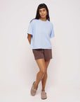 Organic_cotton_outfit_with_blue_boxy_t-shirt_and_brown_shorts