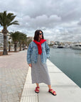 Relaxed t-shirt dress in black and white stripe pattern worn on holiday