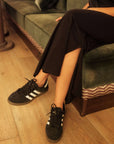 Side_splits_in_black_t-shirt_dress