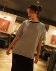 Thia_Organic_Cotton_Black_Fine_Stripe_T-Shirt_with_black_skirt