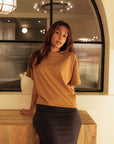 Toffee_coloured_cropped_organic_with_navy_skirt