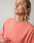 Washed look watermelon sweatshirt with V detail