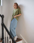 Olive_green_boyfriend_fit_t-shirt with blue jeans