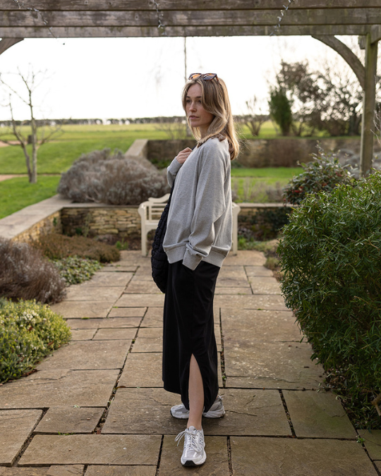 grey marl sweatshirt worn with black dress