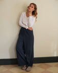 long sleeve v tee in white with navy blue joggers