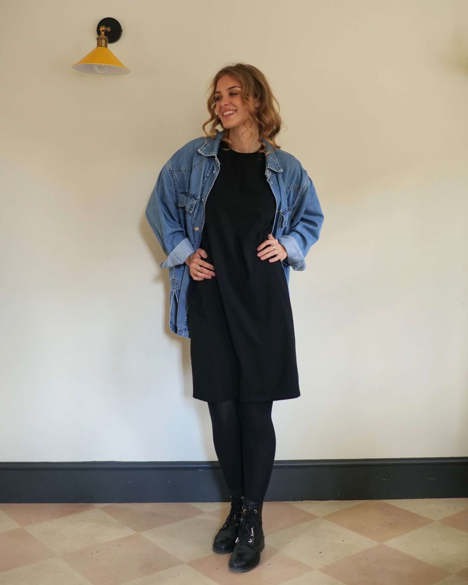 Short_black_t-shirt_dress_with_tights_for_winter