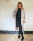 Short_black_t-shirt_dress_with_tights_for_winter