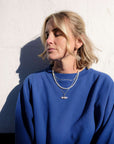 Cobalt_blue_sweatshirt_with_loop_back_finish_on_reverse