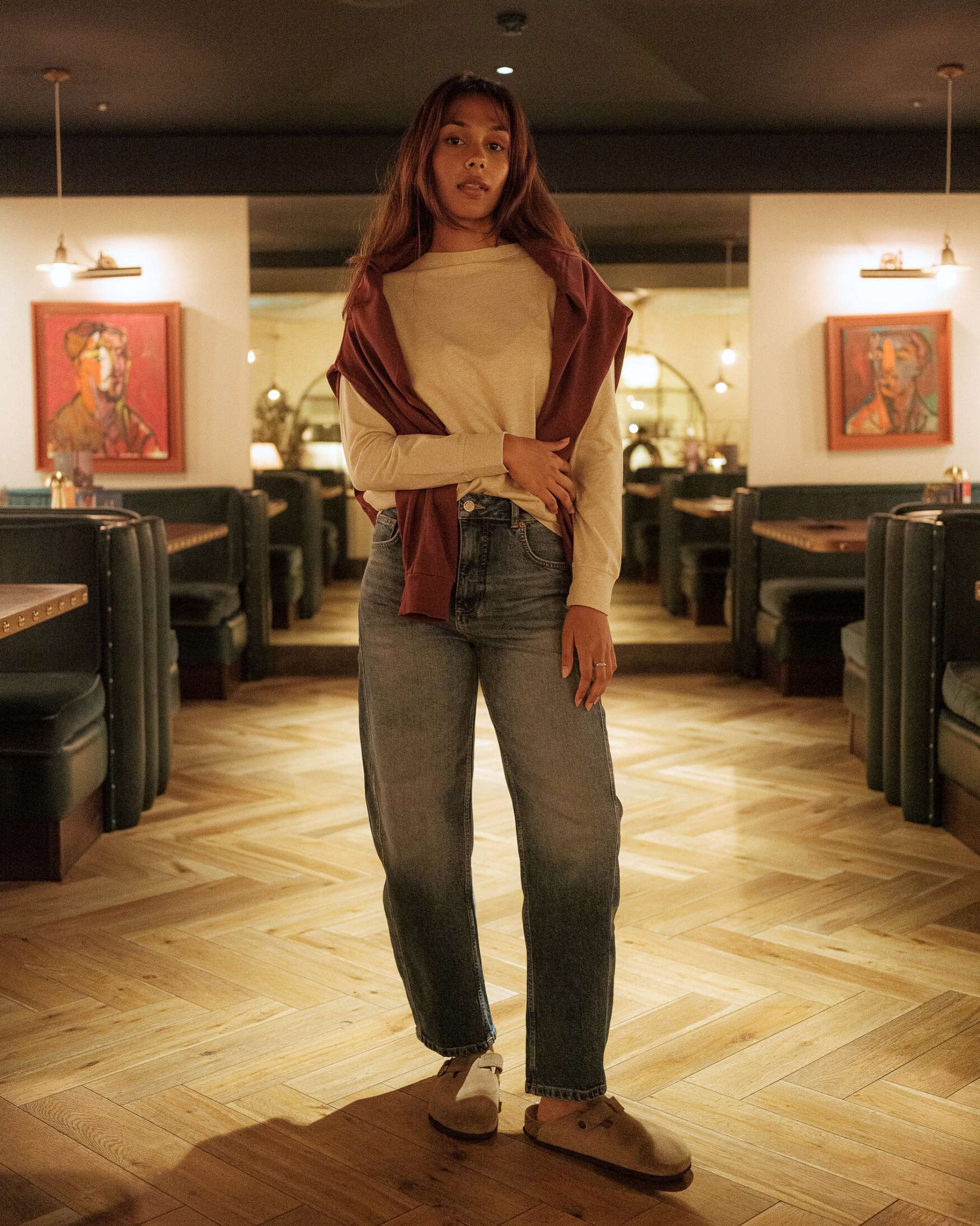 Cream_long_sleeve_top_styled_with_jeans_and_sweatshirt