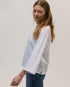 Fully_bound_side_splits_in_white_organic_cotton_top