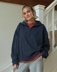Navy_half_zip_sweatshirt_with_relaxed_fit