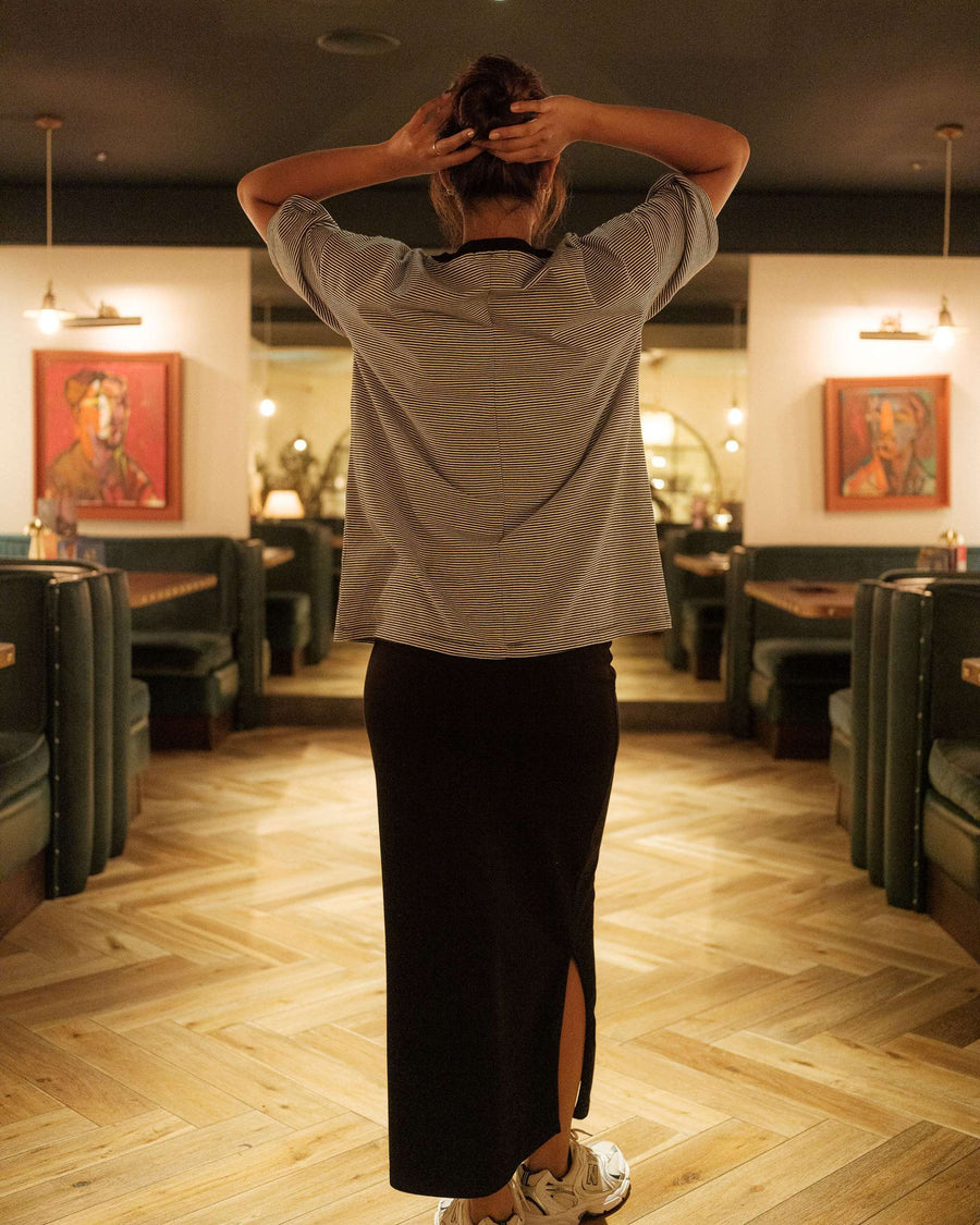 Oversized_t-shirt_with_black_skirt
