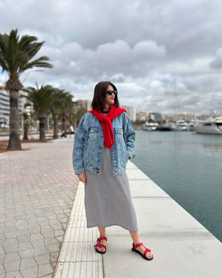 Relaxed t-shirt dress in black and white stripe pattern worn on holiday