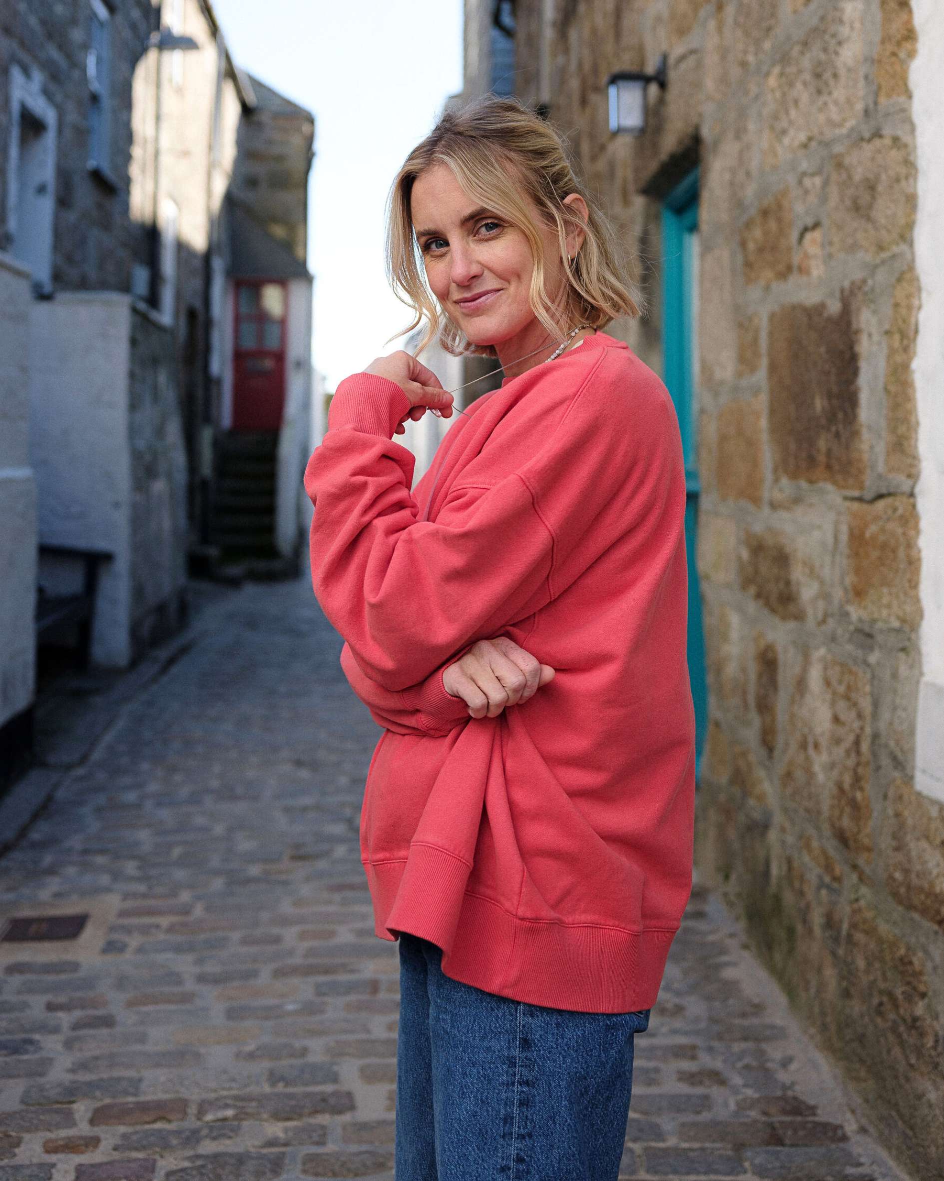 Shop_oversized_washed_red_sweatshirt_from_slow_fashion_brand