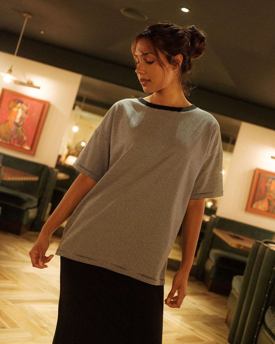 Thia_Organic_Cotton_Black_Fine_Stripe_T-Shirt_with_black_skirt