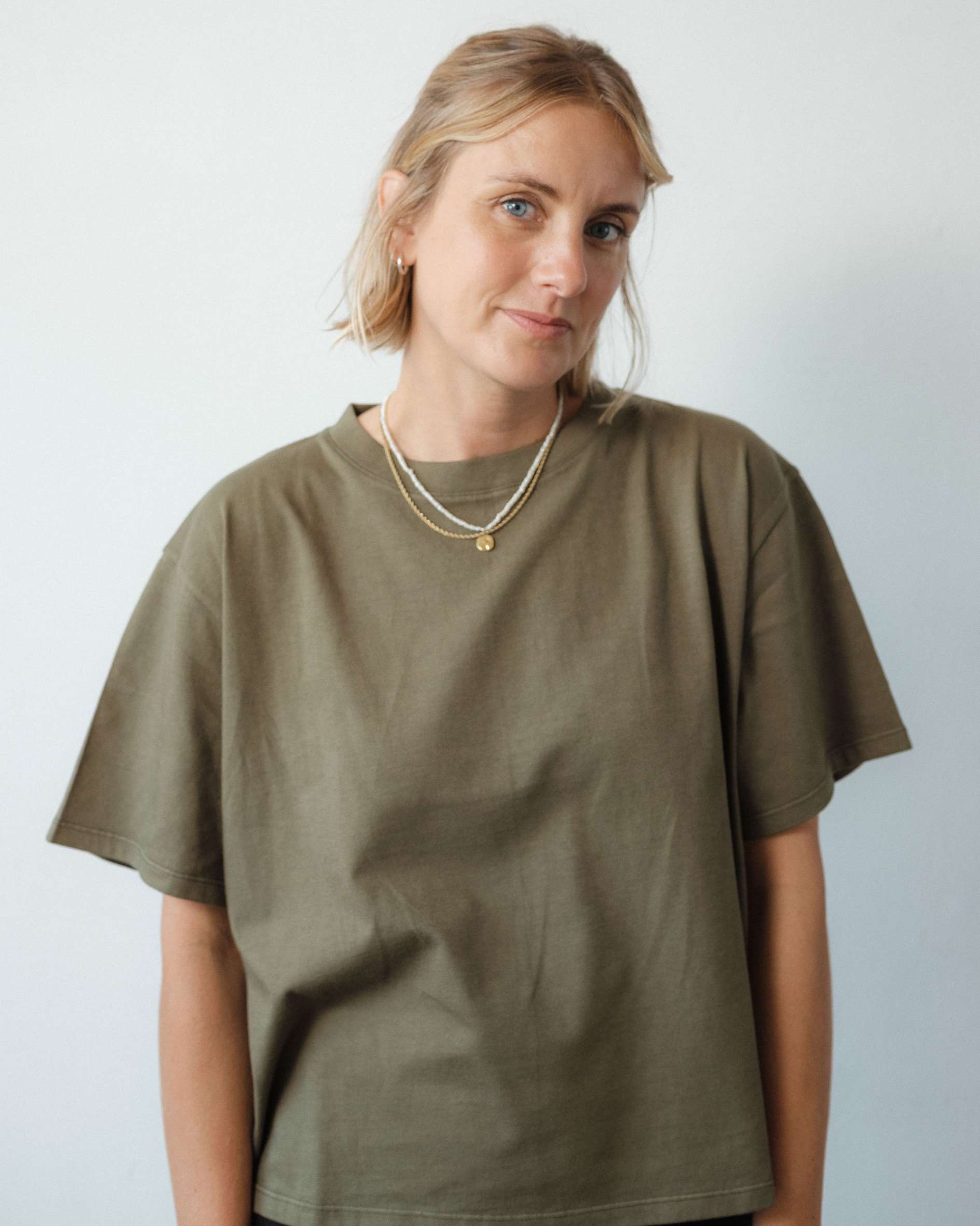 Women_s_boxy_t-shirt_in_dark_olive_-_organic_cotton