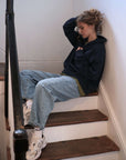 green tee under navy blue half zip sweat