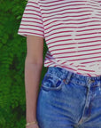 woman wearing red stripe tee